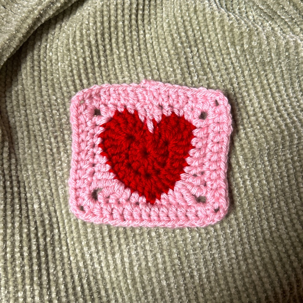 Handmade crochet heart coaster